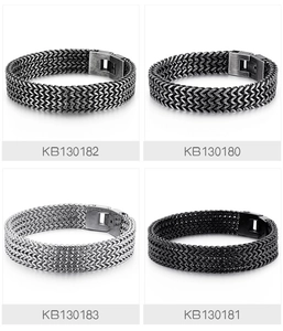 Detailed close-up of men's stainless steel dragon scale bracelets in four metallic finishes