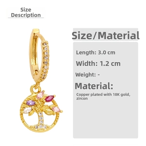 Macro detail of Tree of Life earrings in 18K gold plated copper with colored zircon stones