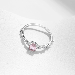 Elegant s925 sterling silver ring featuring an oval pink crystal and sparkling zircon accents