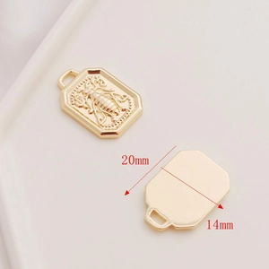 Macro detail of 14K gold plated 3D rose pendants for DIY jewelry with 20x14mm dimensions