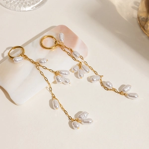 Elegant gold chain earrings with baroque white pearls and long tassels in stainless steel