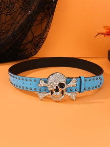 Close-up of blue leather belt with silver rhinestone skull buckle and metal studs
