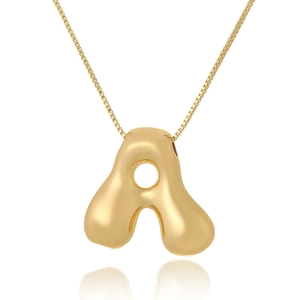 Detailed close-up of golden letter A pendant necklace with polished finish and soft reflection