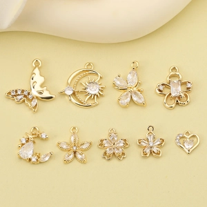 14K gold plated butterfly and floral charms set with sparkling cubic zirconia stones