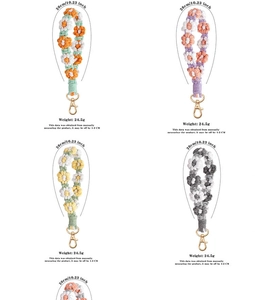Detail view of handmade braided daisy phone straps with golden lobster clasps in 4 colors