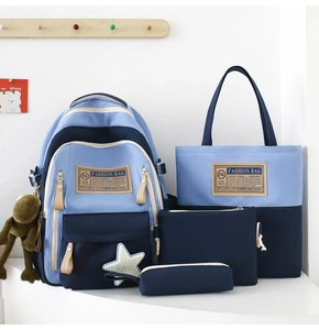 Detailed four-piece set including a color-block blue backpack, handbag, and small pouches