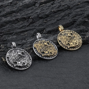 Nordic Viking Wolf pendant in silver, gold, and bicolor finishes on dark stone background