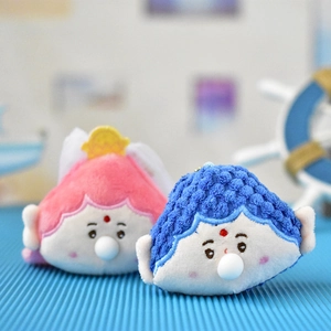 Dos lindos colgantes de muñeco de Buda de peluche rosa y azul que soplan burbujas