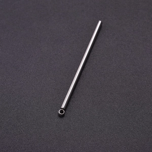 Macro detail of minimalist 304 stainless steel bar pendant with ring for DIY jewelry