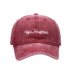 Retro washed dark red baseball cap with white Los Angeles embroidery on white background
