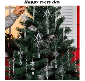Close-up of clear acrylic snowflake and icicle ornaments for Christmas tree decor