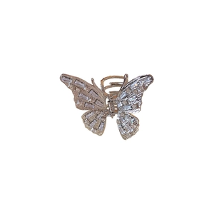 Silver butterfly hair claw clip with sparkling baguette zirconia stones on white background