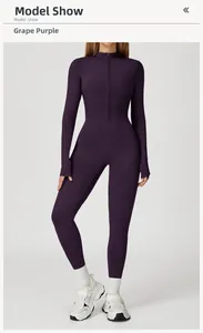 Detailed view of grape purple yoga jumpsuit with front zipper and stand collar