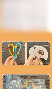 Detail view of the 3D Tang Dynasty girl keychain with brand tag and plastic packaging