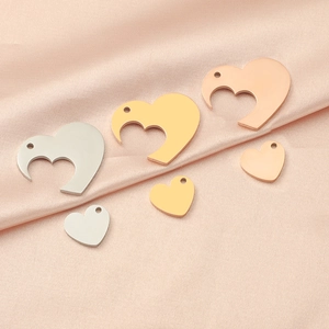 Polished titanium steel split heart pendants for couples in gold, silver, and rose gold