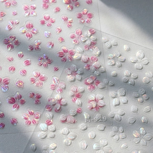 3D embossed cherry blossom nail stickers with gradient pink and pearlescent floral designs