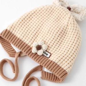 Cute baby knitted beanie with flower detail, warm fleece lining and ear protection