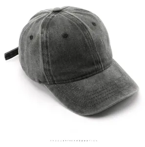 Top view of washed charcoal grey baseball cap with embroidery and breathable eyelets