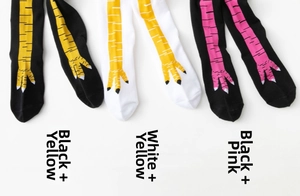 Detailed view of three creative chicken feet socks in black, white, and pink color options