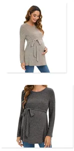 Close-up of maternity knit sweater showing ribbed texture and adjustable waist belt