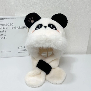 Macro shot of fluffy panda hooded scarf with cute pink paw prints and soft plush texture