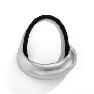 Close-up of polished silver metal C-shaped cuff on a black elastic hair tie