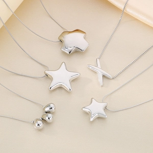 Polished silver stainless steel star pendant necklaces set with sleek snake chains