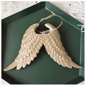 Golden feather wing ornament with glitter detail for Christmas holiday decoration