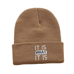 Brown knit beanie featuring IT IS WHAT IT IS white embroidery for men and women