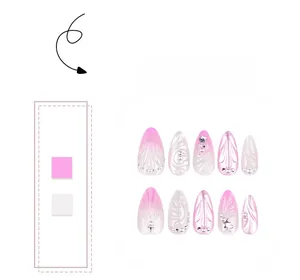 Detail view of 3D pink gradient shell nails with pearl accents and floral patterns
