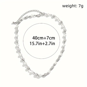 Detail view of pearl and textured bead necklace with 40cm chain and lobster clasp specs