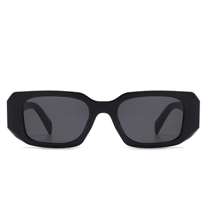 Thick black square frame sunglasses with geometric edges and dark grey lenses for unisex