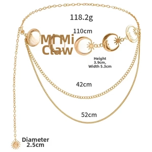 Gold layered chain belt with celestial moon and star charms in a detailed macro view