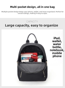 Detailed interior of black waterproof nylon backpack showing large capacity and multi-pockets
