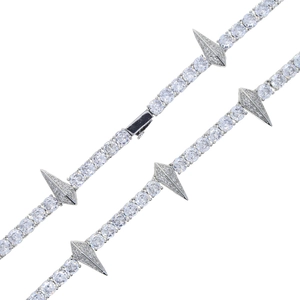 Close-up of 5mm silver tennis chain with sparkling stones and sharp spike pendant details