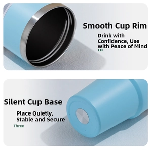 Detailed close-up of smooth rim and non-slip bottom on light blue stainless steel tumbler