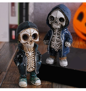 Detailed view of resin skeleton figurines in streetwear hoodies for Halloween decor