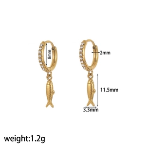 Detail view of gold stainless steel hoop earrings with crystal inlay and fish pendant