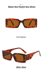 Macro detail of tortoiseshell rectangle sunglasses with thick frames and brown lenses