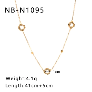 Detailed view of 18K gold plated stainless steel necklace with hollow zircon pendants