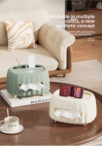 Multifunctional cream style tissue box with remote control storage and phone holder feature