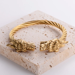 18k gold plated stainless steel dragon head open cuff bracelet on stone base