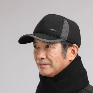 Close-up of winter hat and scarf set for elderly men featuring warm ear protection