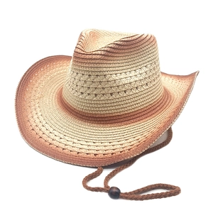 Gradient brown western straw cowboy hat with a braided chin strap and wooden bead
