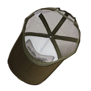 Army green trucker hat with 3D New York embroidery showing inner mesh and stitching