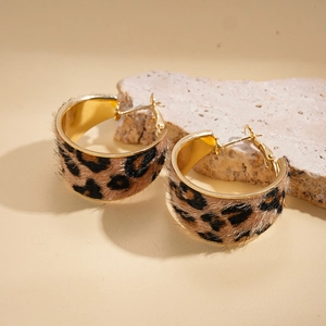 Faux calf hair leopard print hoop earrings with gold finish on a natural stone base