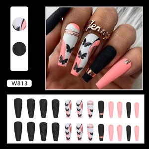 Long ballerina press-on nails with matte black butterfly design and gold stripes