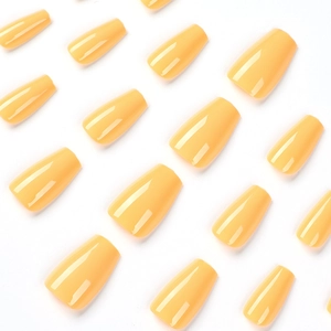 Glossy cream yellow short ballerina press-on nails with a smooth polished finish