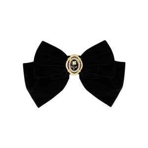 Vintage black velvet bow hair clip with a gold rose medallion and pearl trim