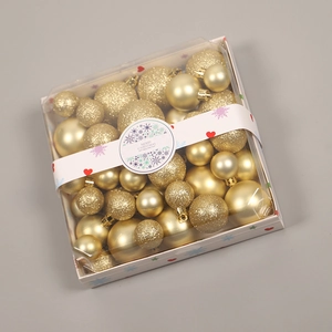 Golden Christmas ball ornament set with shiny matte and glitter finishes in a clear box